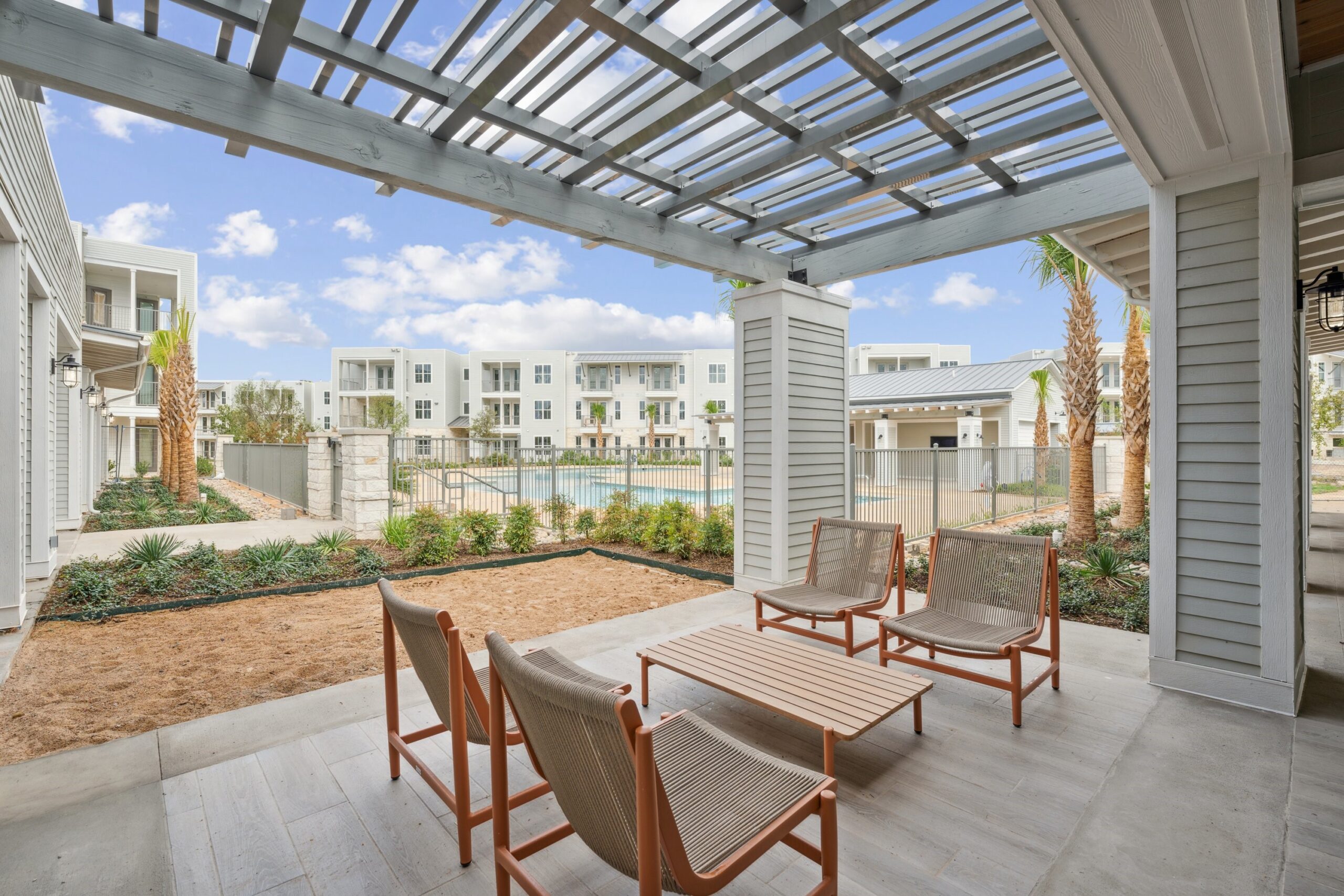 Outdoor lounge area at Legacy at Veramendi apartments