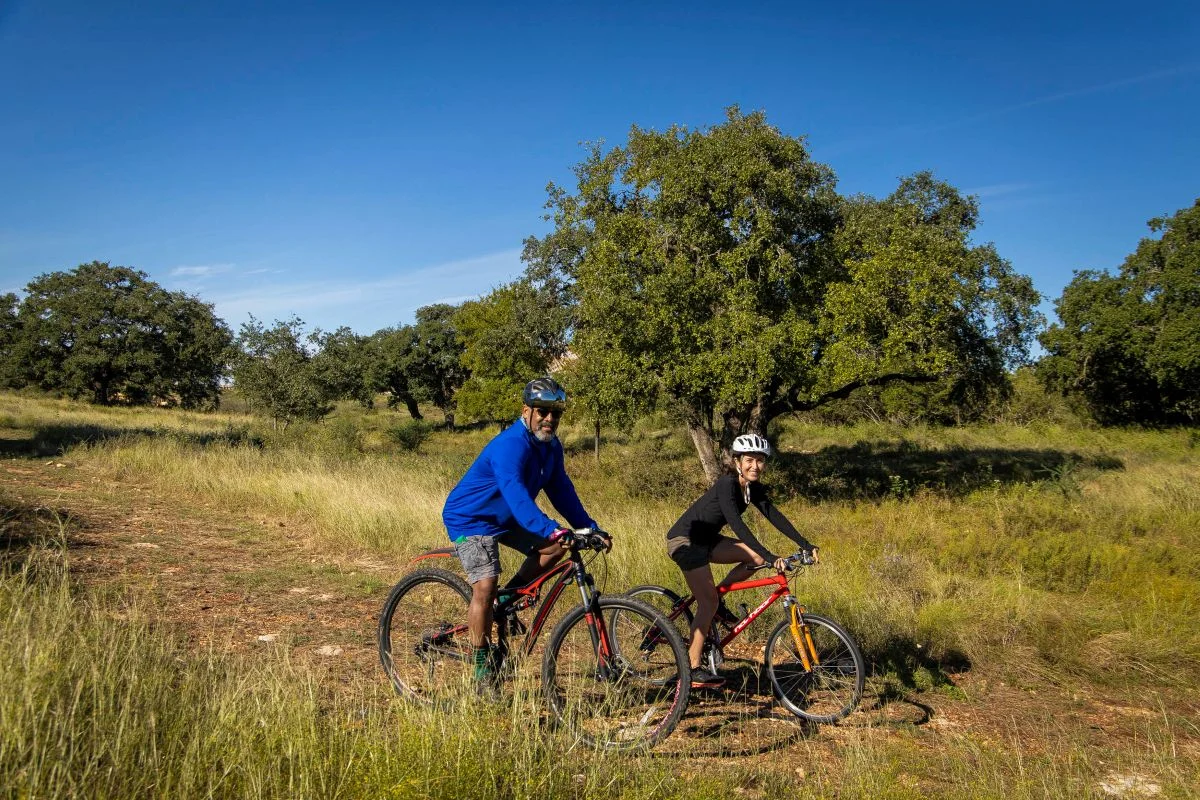 Veramendi residents biking in one of the many Veramendi trails.
